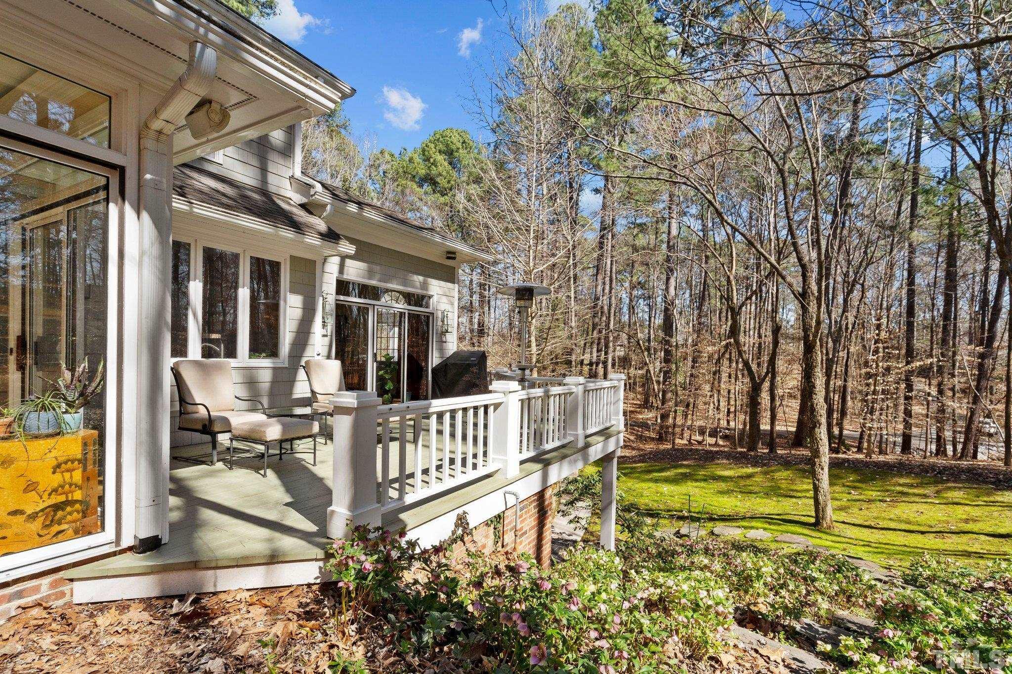 3518 Ridge Road Durham, NC 27705 - Photo 11 of 47 From lush yard a glance back to the pretty deck.