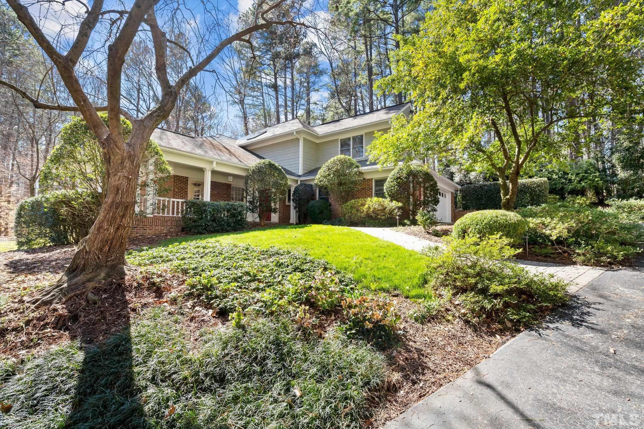 3518 Ridge Road Durham, NC 27705 - Photo 17 of 47 Lovely approach to this home includes asphalt guest parking, brick walkway and mature landscape.
