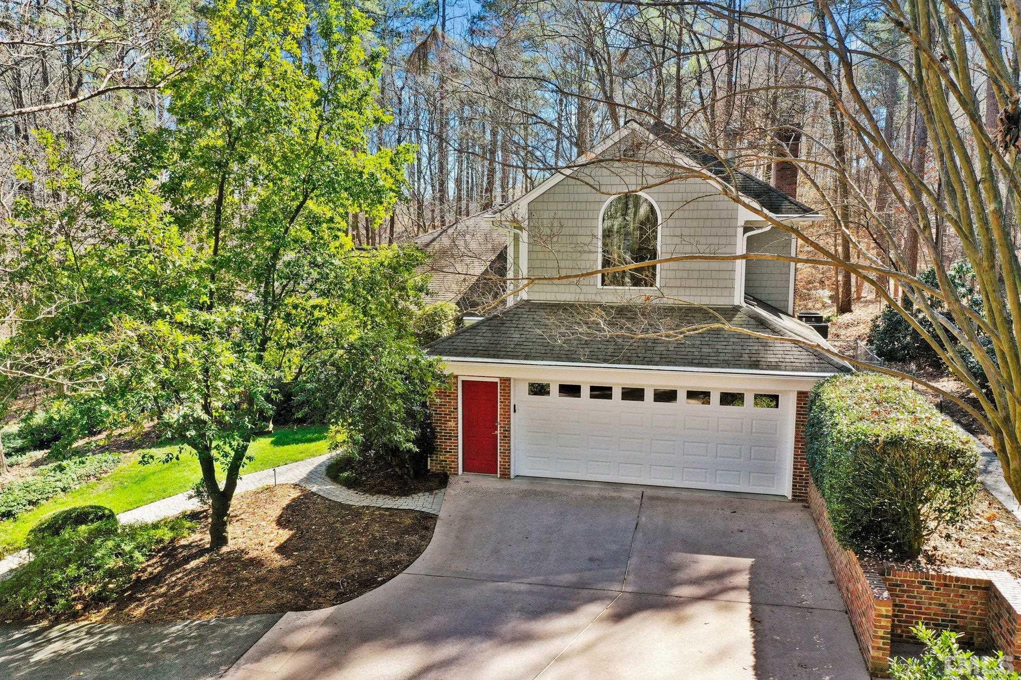 3518 Ridge Road Durham, NC 27705 - Photo 19 of 47 Treetop view of garage and pretty window in MBR.