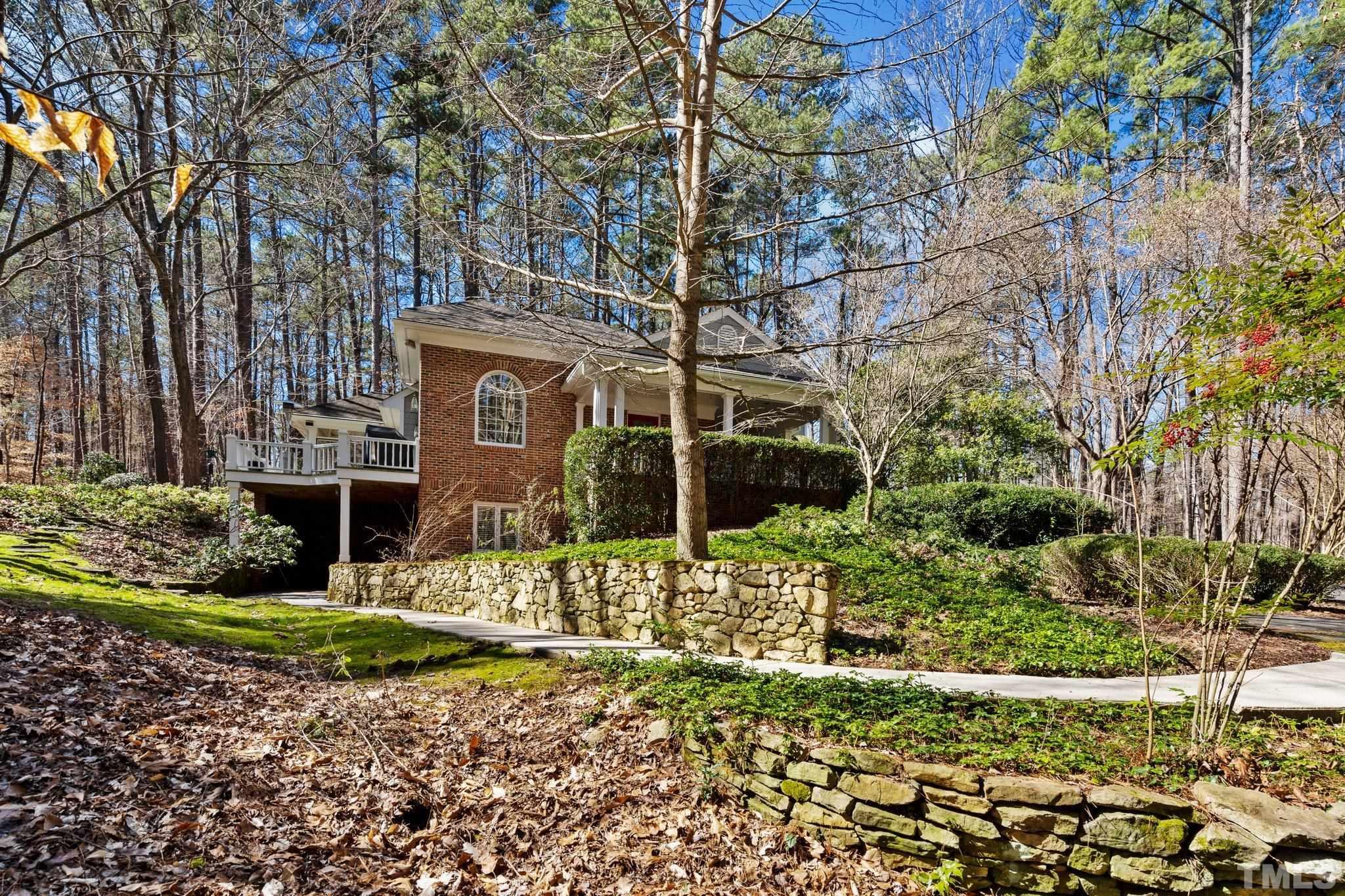 3518 Ridge Road Durham, NC 27705 - Photo 20 of 47 Gorgeous stone walls and lush plantings frame the home.