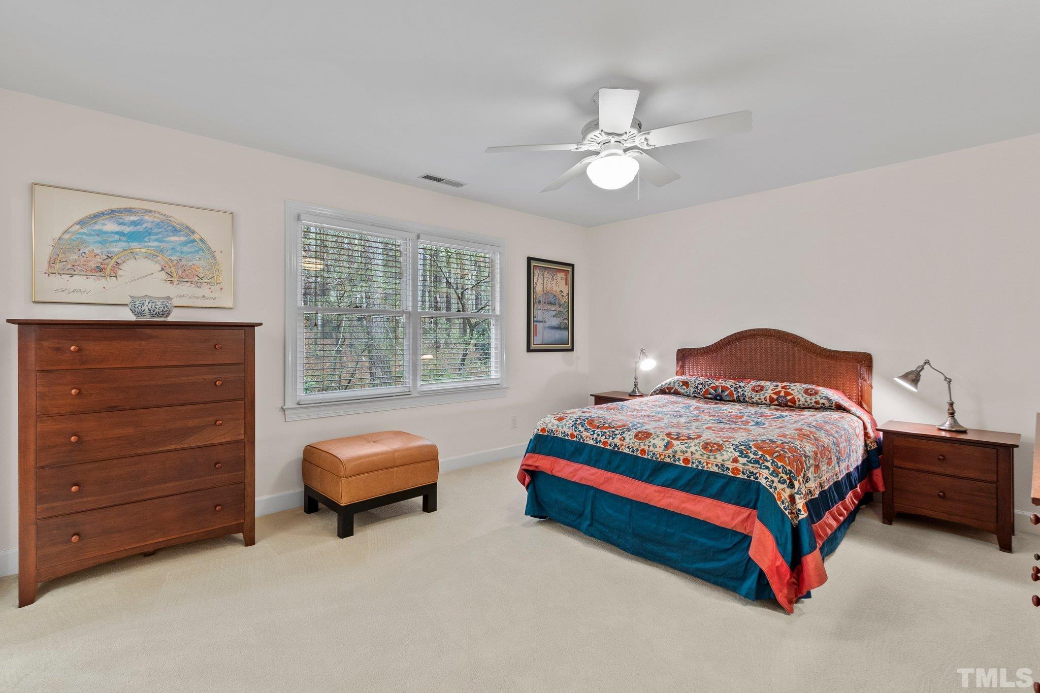 3518 Ridge Road Durham, NC 27705 - Photo 28 of 47 Second large guest bedroom with ceiling fan and neutral carpet.