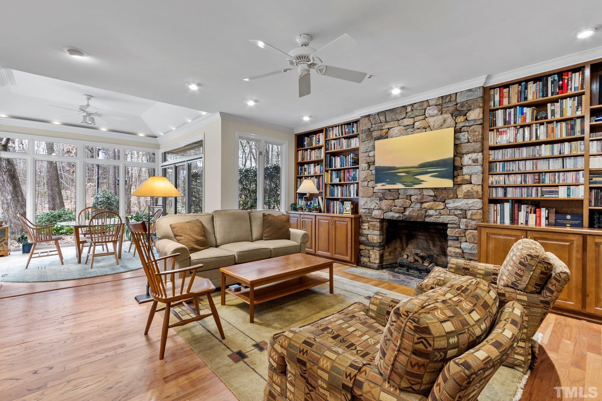 3518 Ridge Road Durham, NC 27705 - Photo 8 of 47 Fabulous cozy space with stone fireplace, bookcases and just steps from the kitchen!