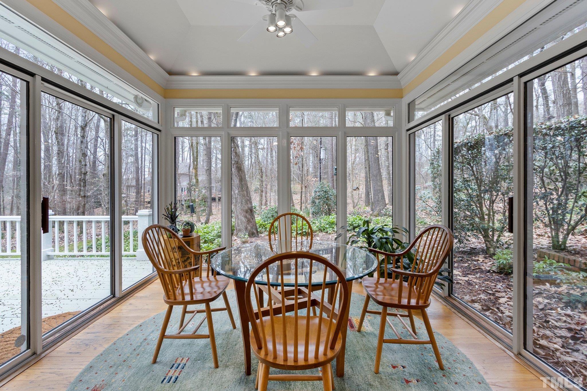 3518 Ridge Road Durham, NC 27705 - Photo 9 of 47 Ceiling vault with accent lighting and glass views from 3 sides.