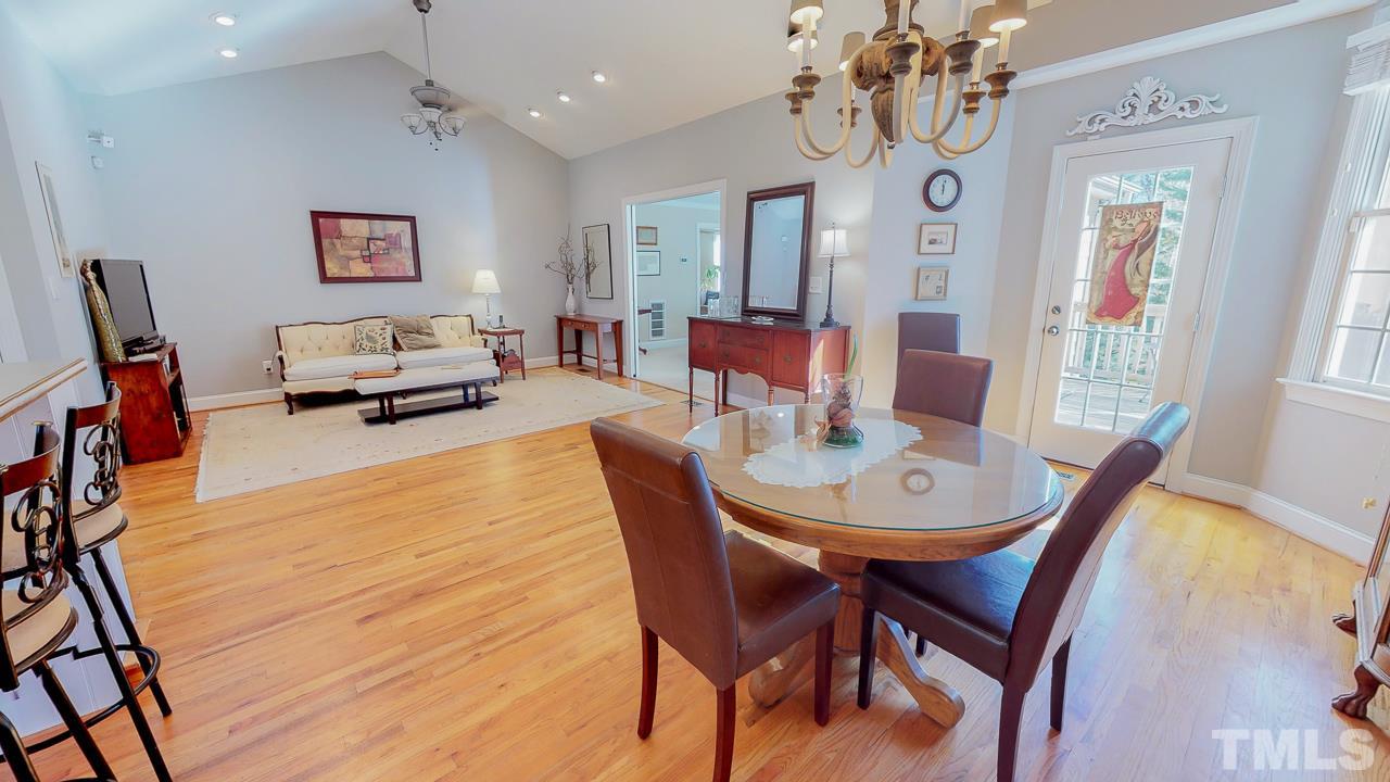 522 Edwin Court Roxboro, NC 27573 - Photo 5 of 24 a view of a dining room with furniture and a chandelier