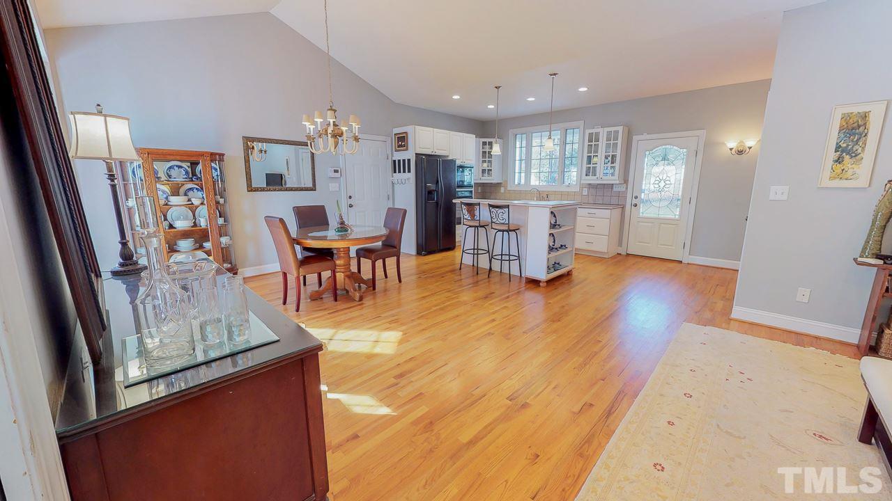 522 Edwin Court Roxboro, NC 27573 - Photo 8 of 24 wooden floor and dining room with furniture
