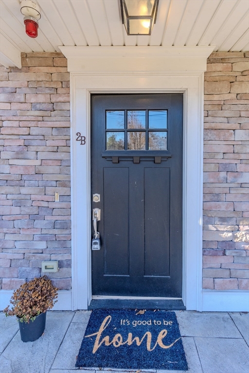 2 Mitchell Lane, Unit B Weymouth, MA 02190 - Photo 2 of 31 a view of entryway with a wooden floor