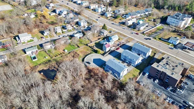 a view of a building with a yard