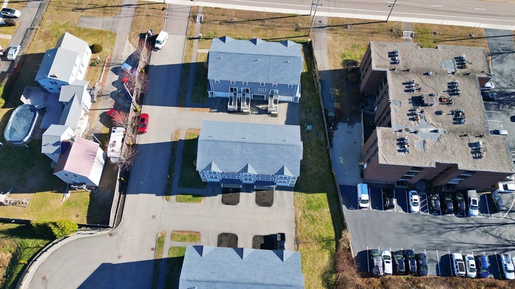 2 Mitchell Lane, Unit B Weymouth, MA 02190 - Photo 29 of 31 an aerial view of houses with outdoor space