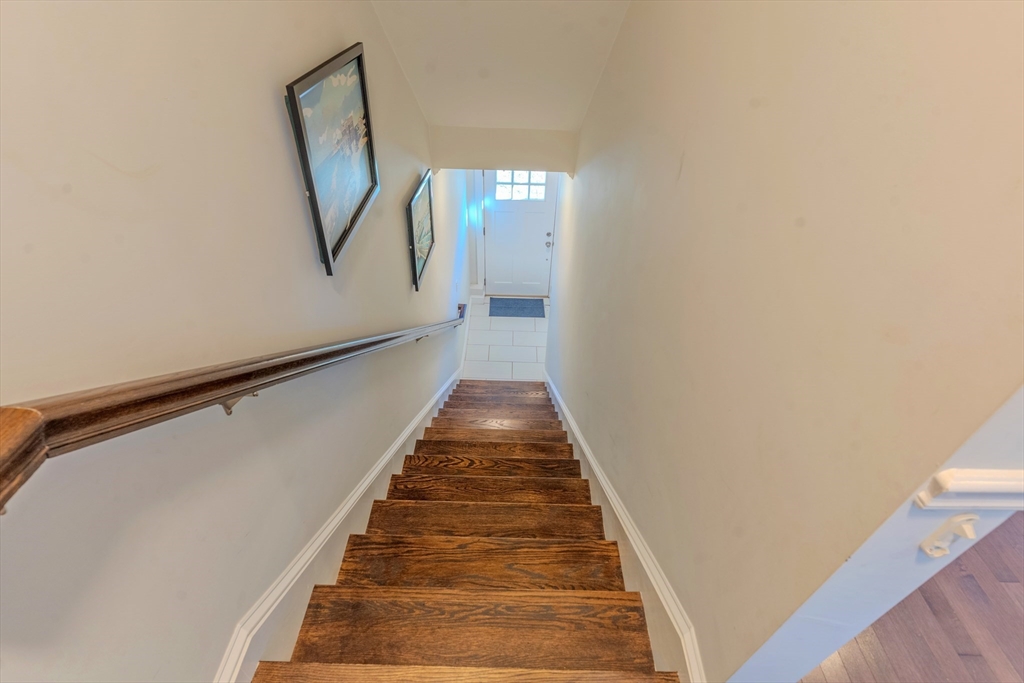 2 Mitchell Lane, Unit B Weymouth, MA 02190 - Photo 10 of 31 a view of a hallway with wooden floor