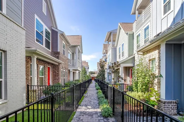 a city street lined with tall buildings