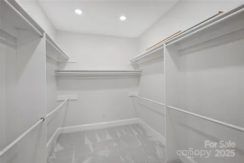 a view of an empty walk in closet