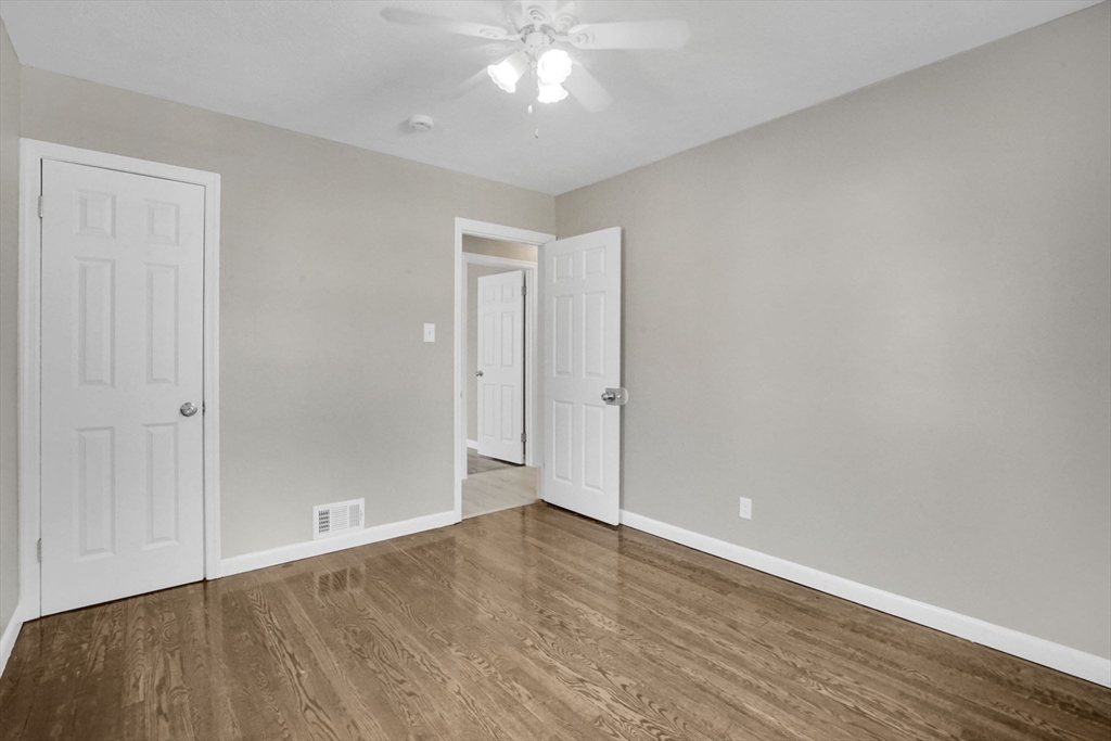 55 Pheland Street Springfield, MA 01109 - Photo 17 of 28 wooden floor in an empty room