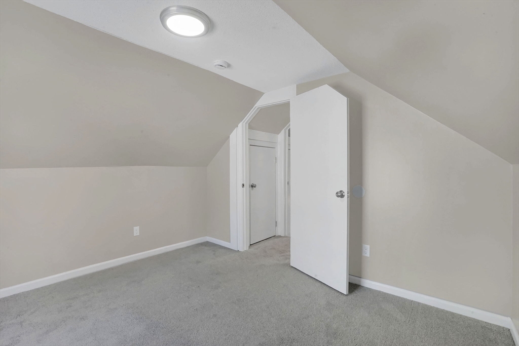 55 Pheland Street Springfield, MA 01109 - Photo 19 of 28 an empty room with a bathroom