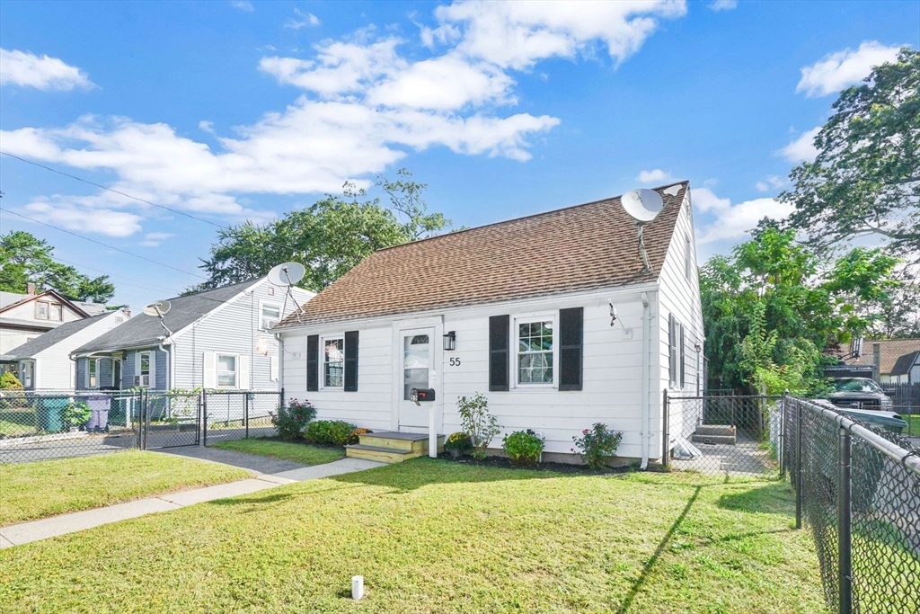55 Pheland Street Springfield, MA 01109 - Photo 2 of 28 a view of a house with swimming pool and a yard