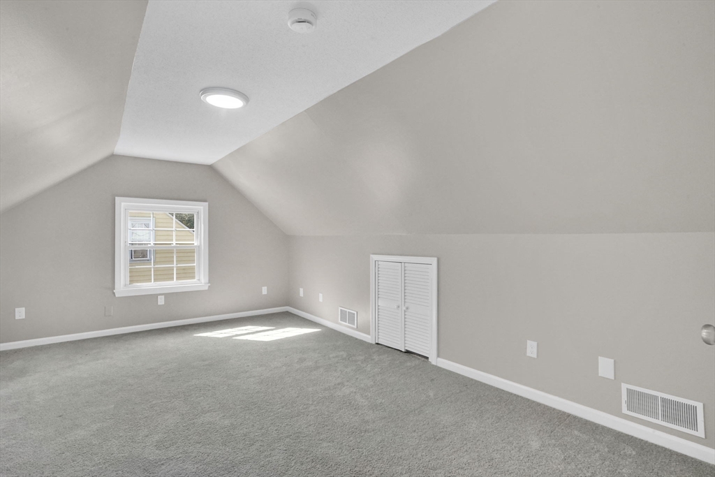 55 Pheland Street Springfield, MA 01109 - Photo 21 of 28 an empty room with a window