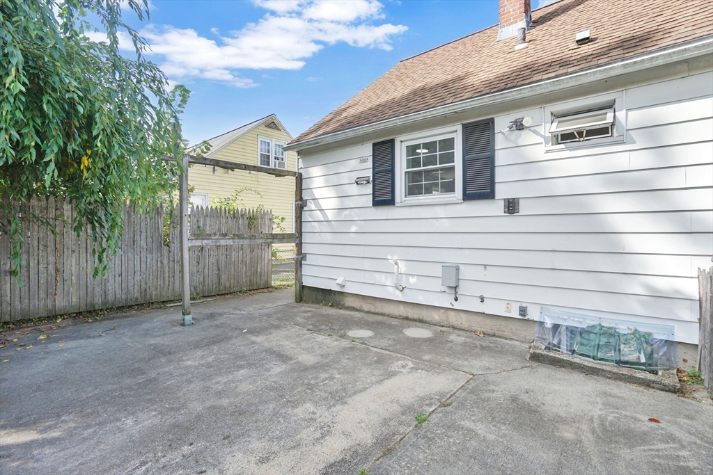 55 Pheland Street Springfield, MA 01109 - Photo 25 of 28 a view of a house with a backyard