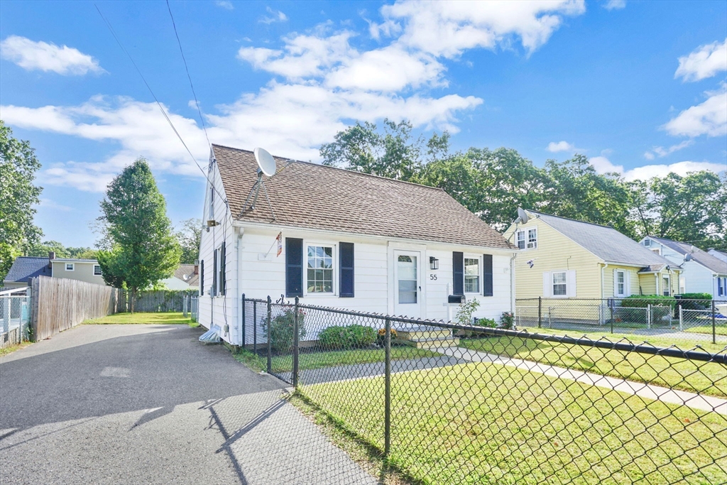 55 Pheland Street Springfield, MA 01109 - Photo 3 of 28 a view of a house with a backyard