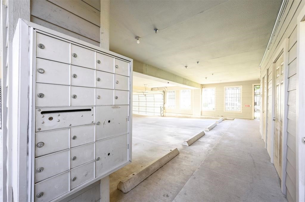 2216 Chenevert Street, Unit 4 Houston, TX 77003 - Photo 22 of 23 a view of a bedroom with cabinet