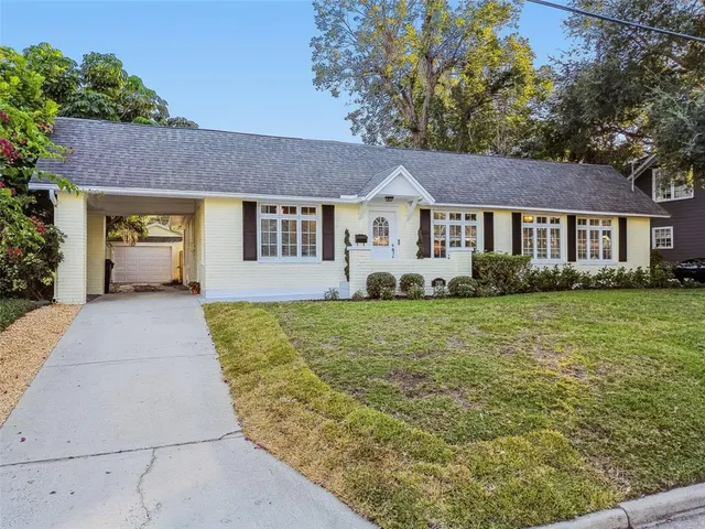 front view of a house with a yard