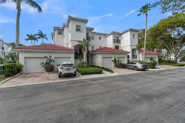 a view of swimming pool with outdoor seating and trees