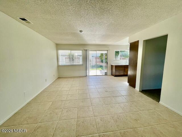 1012 West Anthony Way Lompoc, CA 93436 - Photo 12 of 38 a view of an empty room with a fireplace