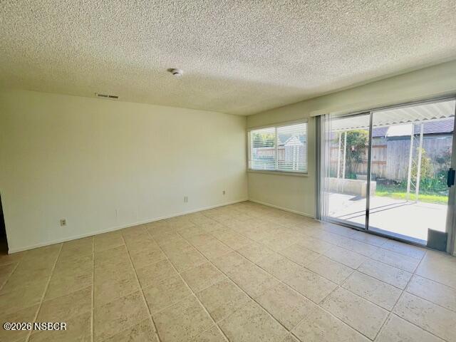 1012 West Anthony Way Lompoc, CA 93436 - Photo 14 of 38 a view of an empty room with a window