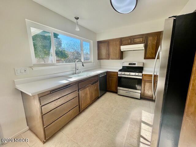 1012 West Anthony Way Lompoc, CA 93436 - Photo 18 of 38 a kitchen with a sink appliances and cabinets