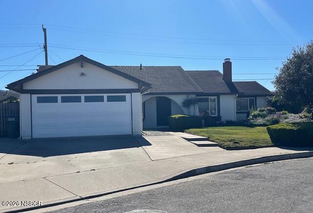 1012 West Anthony Way Lompoc, CA 93436 - Photo 2 of 38 a front view of a house with a yard and garage