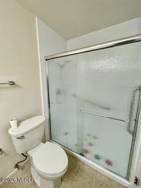 1012 West Anthony Way Lompoc, CA 93436 - Photo 24 of 38 a white toilet sitting next to a shower