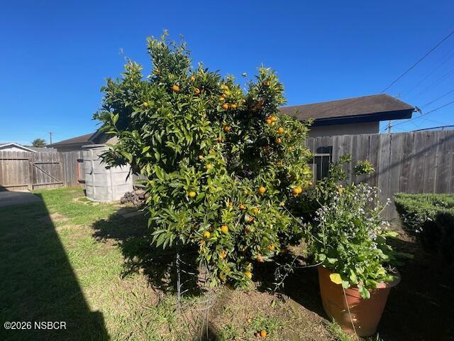 1012 West Anthony Way Lompoc, CA 93436 - Photo 34 of 38 a view of a house with a flower garden