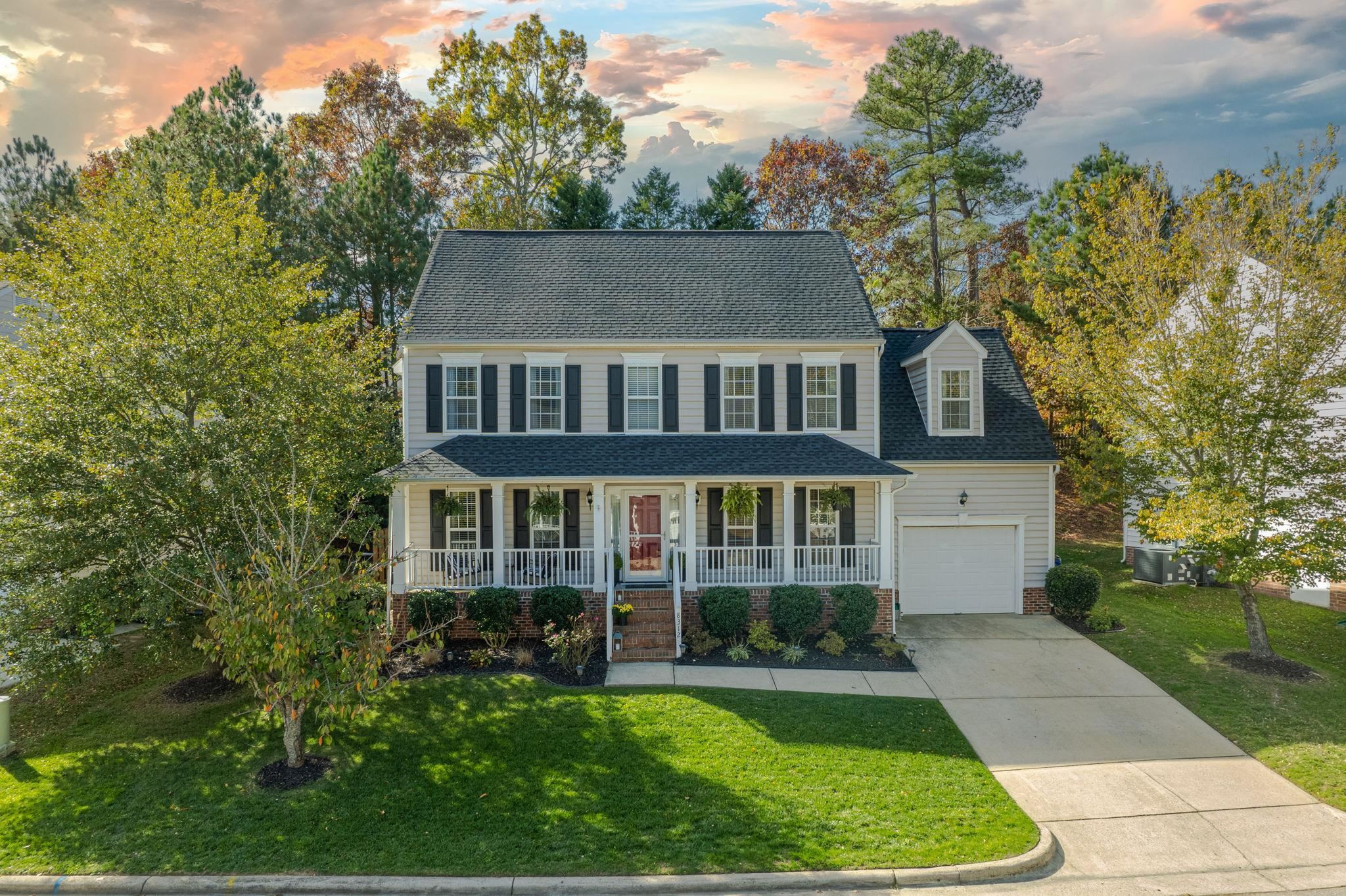 front view of a house with a yard