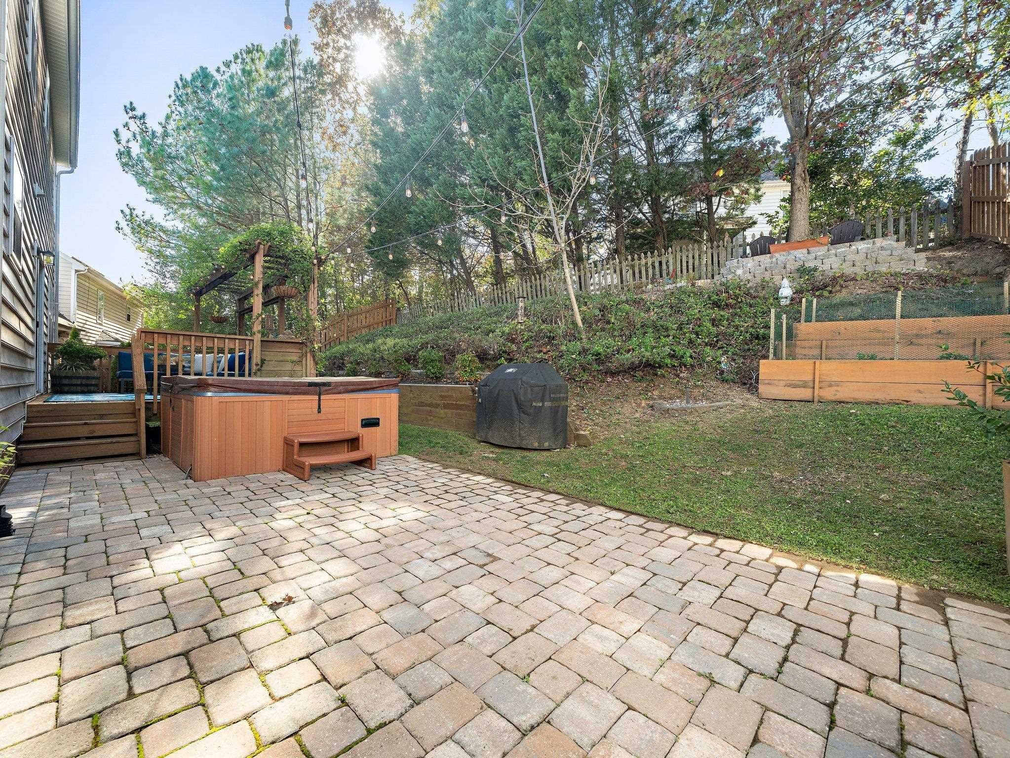 8312 Hobhouse Circle Raleigh, NC 27615 - Photo 28 of 39 a backyard of a house with seating space