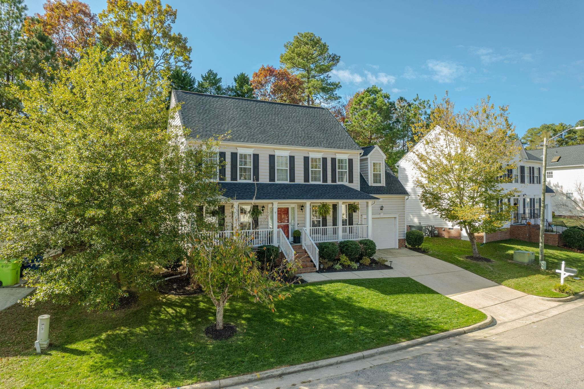8312 Hobhouse Circle Raleigh, NC 27615 - Photo 34 of 39 front view of a house with a yard