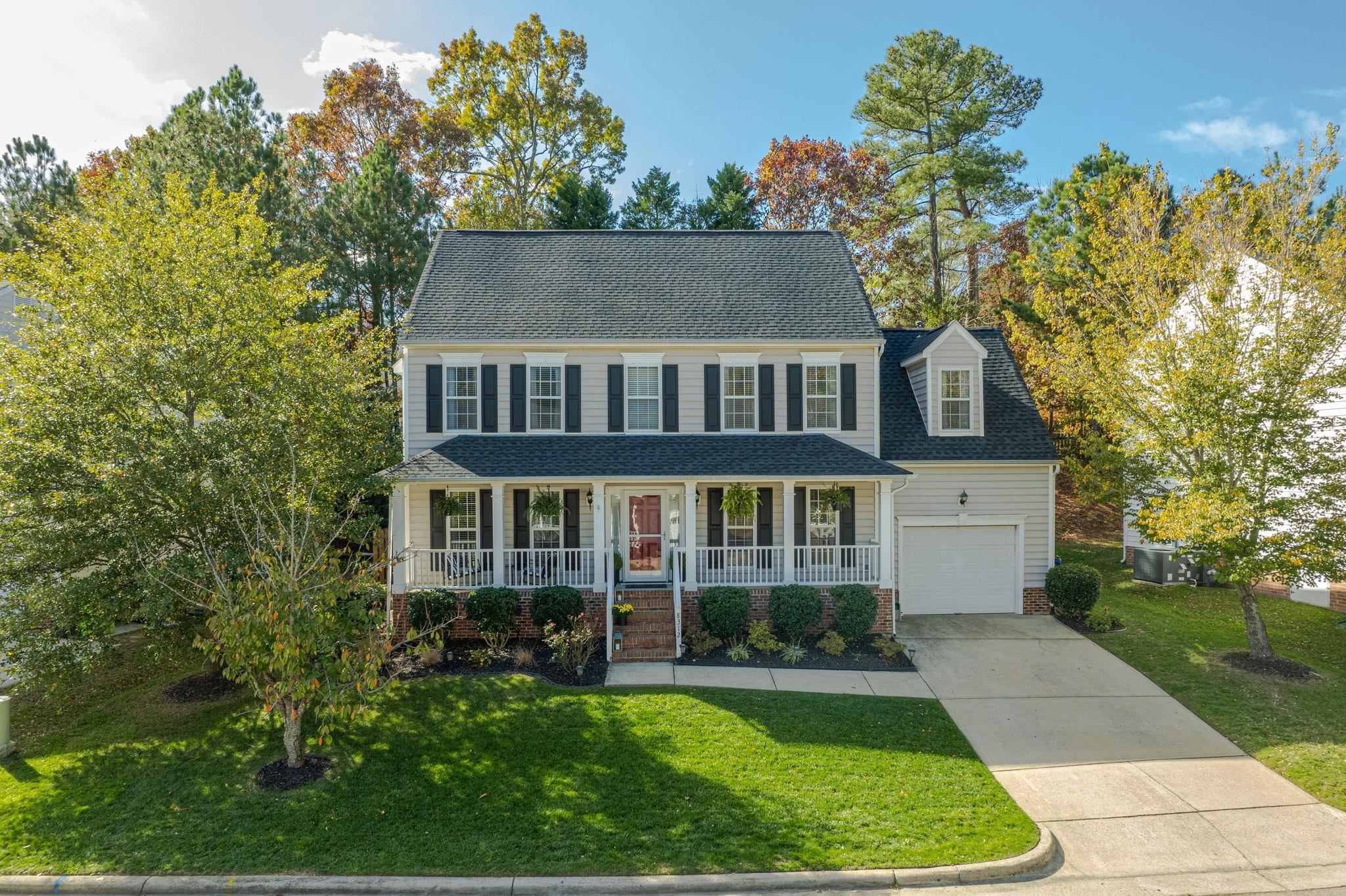 8312 Hobhouse Circle Raleigh, NC 27615 - Photo 35 of 39 front view of a house with a yard
