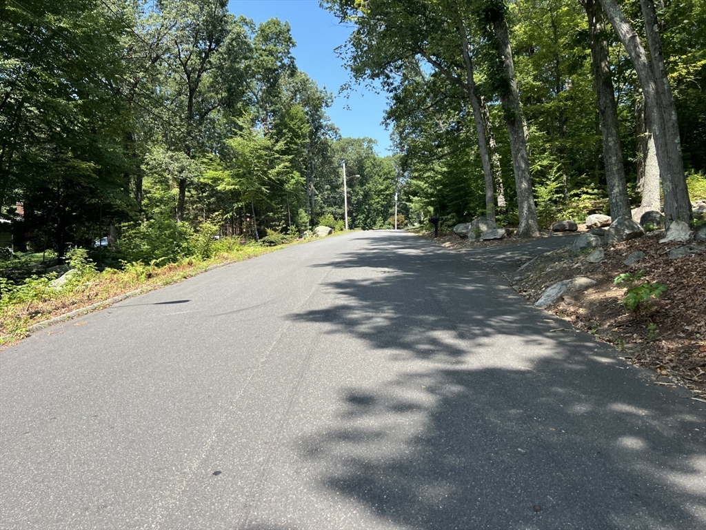 Lot 28 Tower Road Ludlow, MA 01056 - Photo 2 of 4 a view of a road with a trees