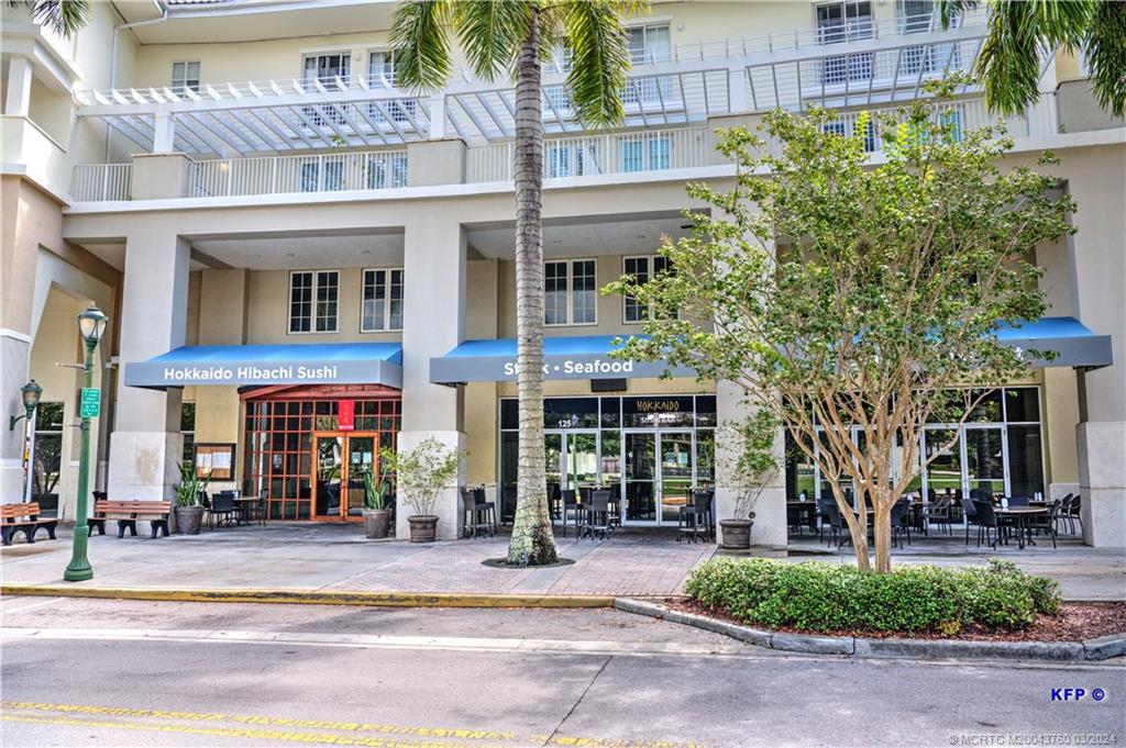 3073 East Community Drive Jupiter, FL 33458 - Photo 66 of 85 a front view of a building