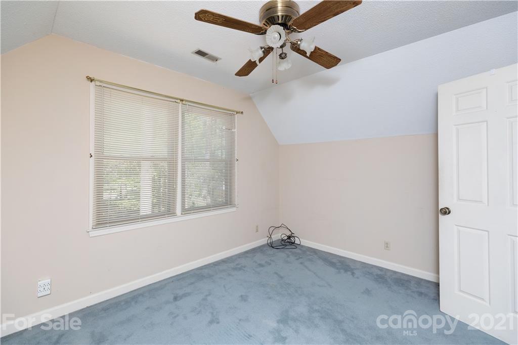 11 Friendfield Court Fort Mill, SC 29715 - Photo 20 of 32 a view of an empty room with a window