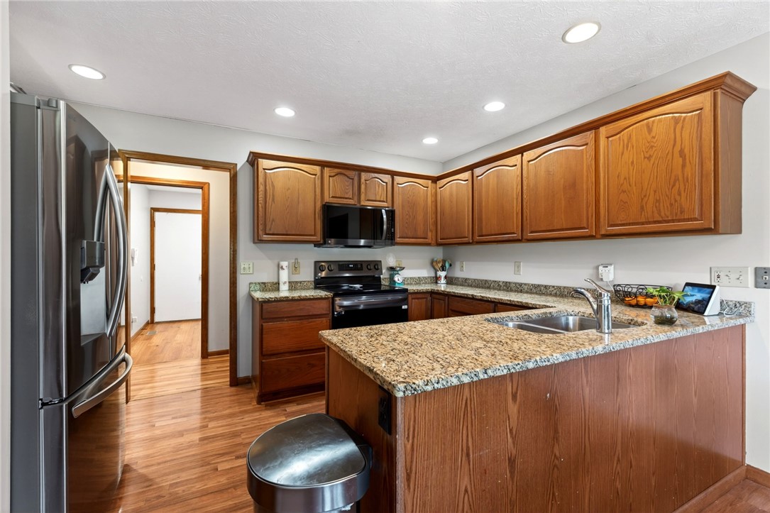 4996 Shannon Avenue Springfield, OH 45504 - Photo 27 of 61 This functional kitchen features ample cabinetry and a convenient breakfast bar perfect for casual dining.