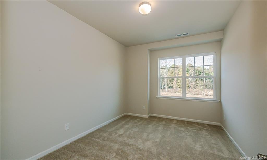 512 Madison Falls, Unit 6 Fort Mill, SC 29708 - Photo 22 of 27 an empty room with a window