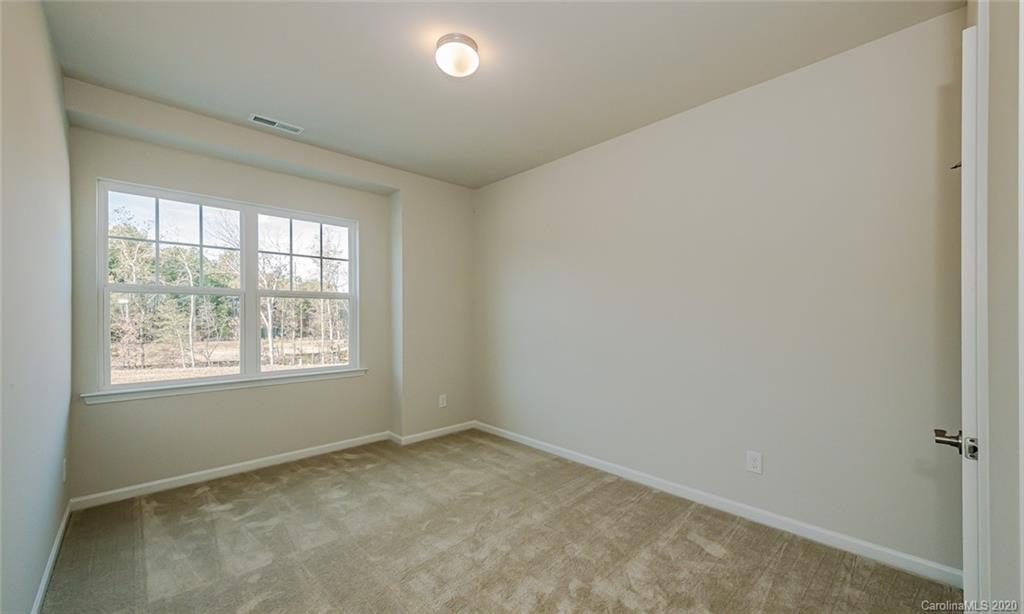 512 Madison Falls, Unit 6 Fort Mill, SC 29708 - Photo 24 of 27 an empty room with a window