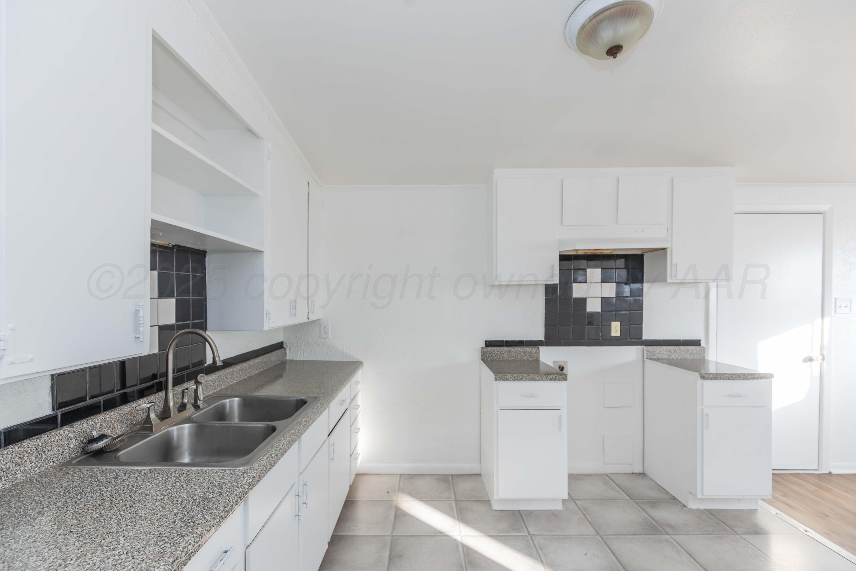 4412 South Hughes Street Amarillo, TX 79110 - Photo 6 of 19 KITCHEN VIEW 3