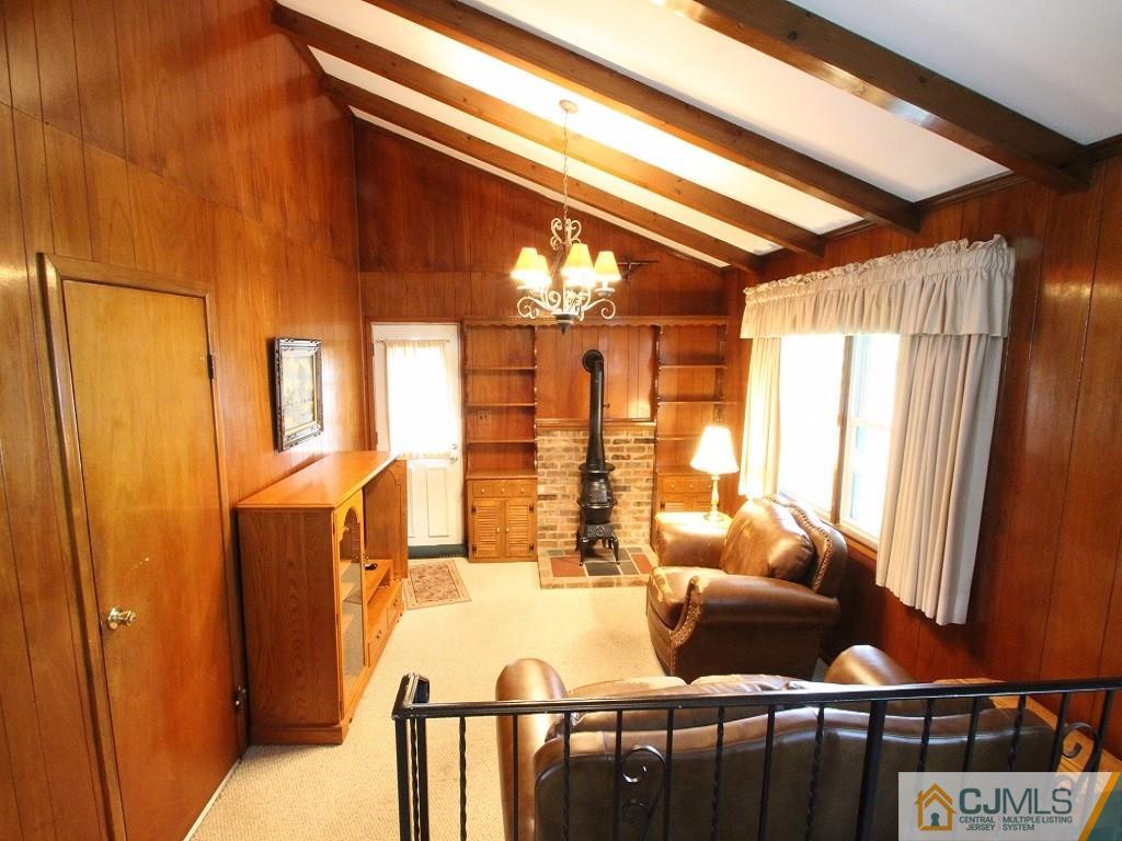 10 Louise Road Edison, NJ 08817 - Photo 6 of 17 a bedroom with furniture and a window