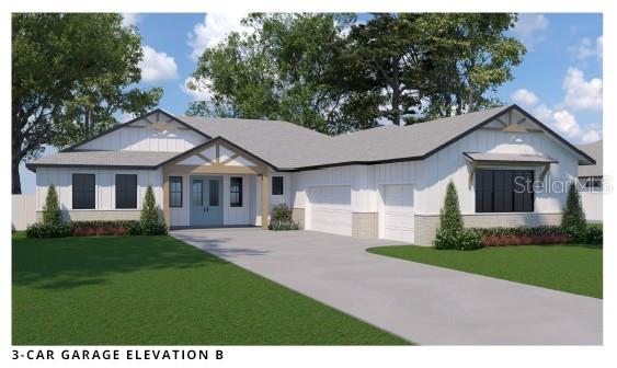 a front view of a house with a garden and yard