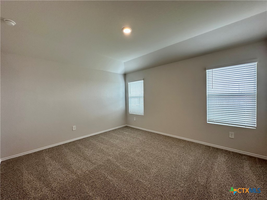 713 Signe Seguin, TX 78155 - Photo 12 of 18 an empty room with a window