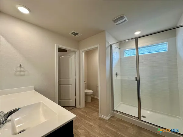 a view of an empty walk in closet