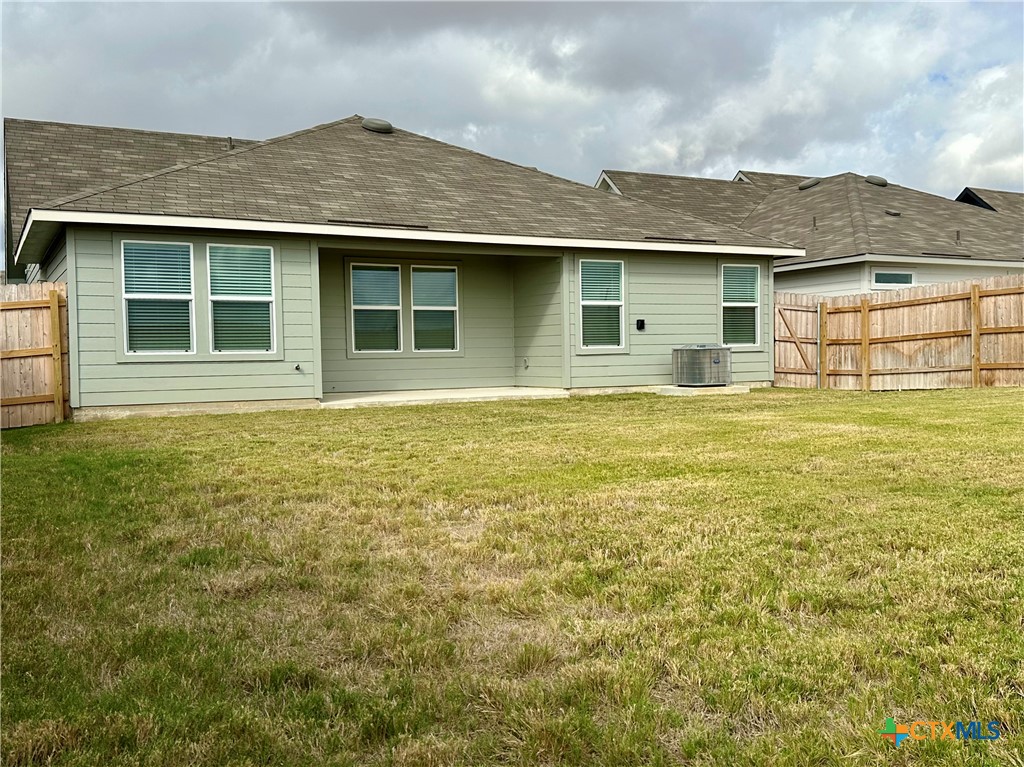 713 Signe Seguin, TX 78155 - Photo 18 of 18 a front view of a house with a garden