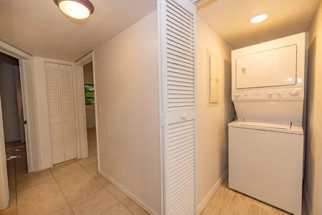a view of storage and utility room with washer and dryer