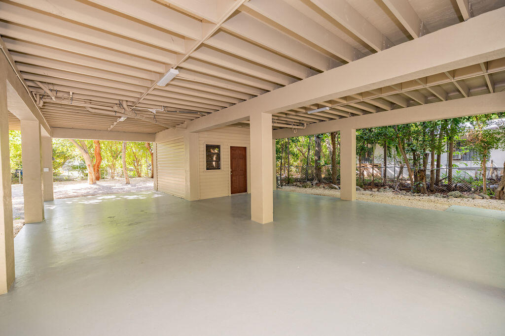 20 Park Road Islamorada, FL 33036 - Photo 30 of 37 a view of an empty room with a fireplace
