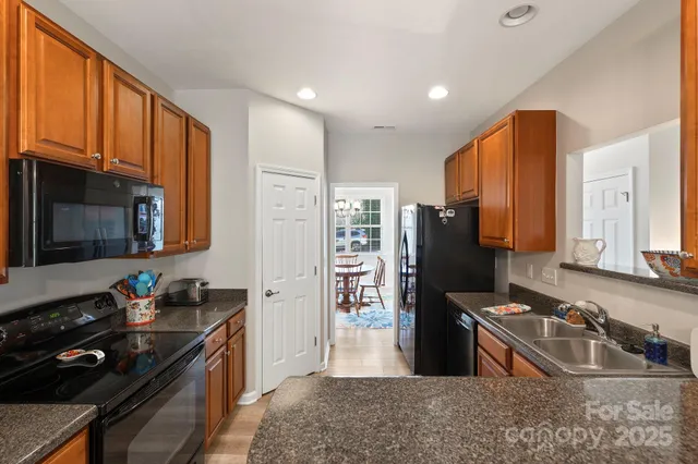 a view of a storage & utility room with closet dryer and washer