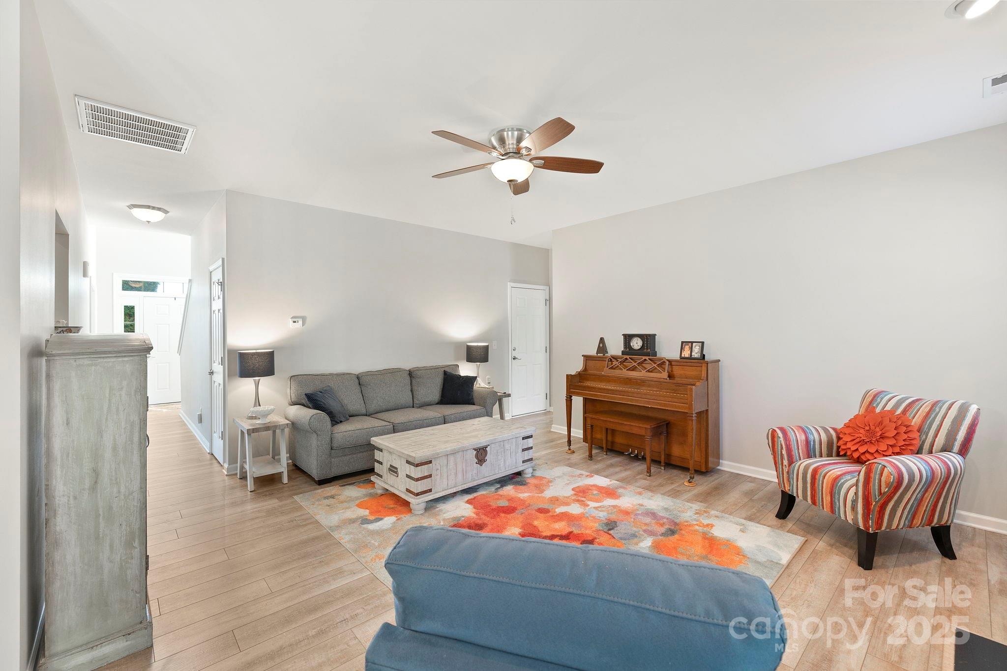 258 Lumber River Road Fletcher, NC 28732 - Photo 20 of 44 a living room with furniture and a couch